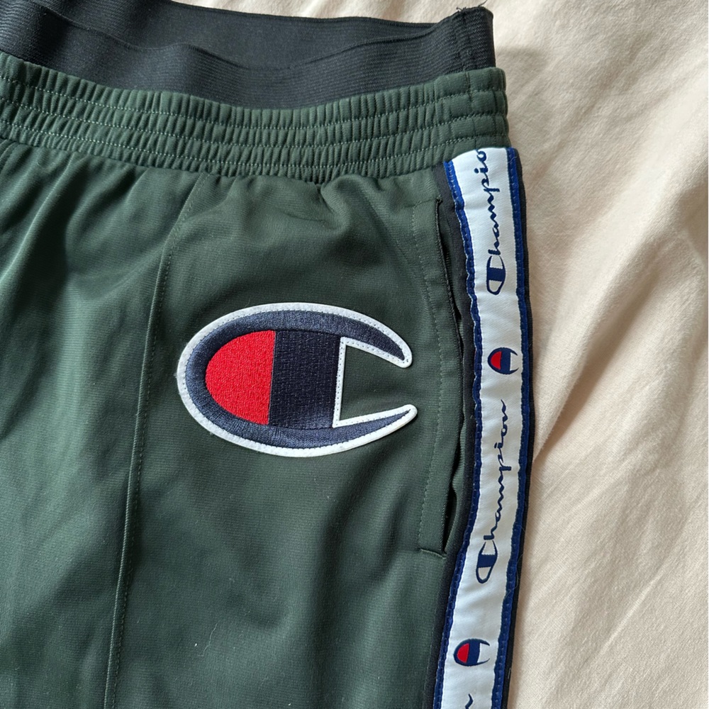 Champion women’s low rise track pants in hunter green SzM